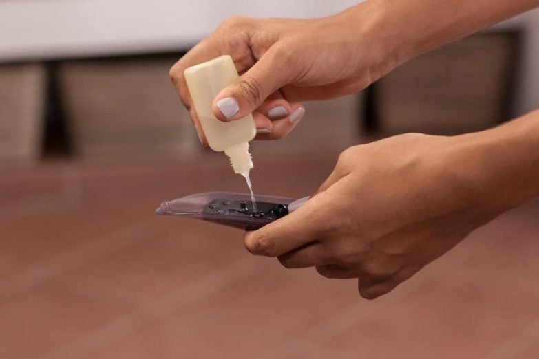 rellenar de agua el depósito de la plancha a vapor