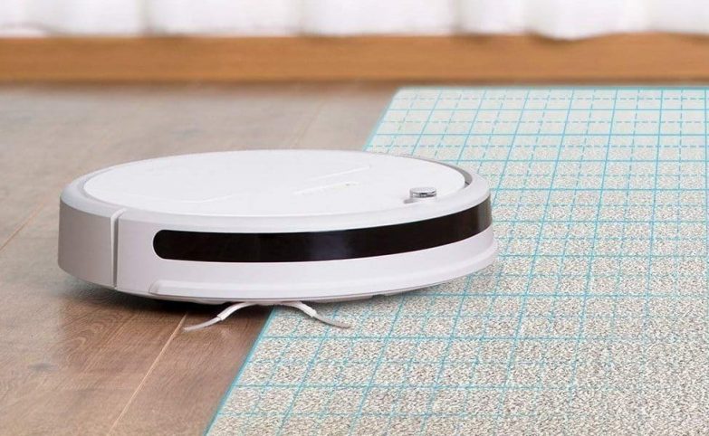 robot aspirador xiaomi en cambio de suelo a alfombra